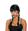Woman with styled black hair in pigtails on a white background