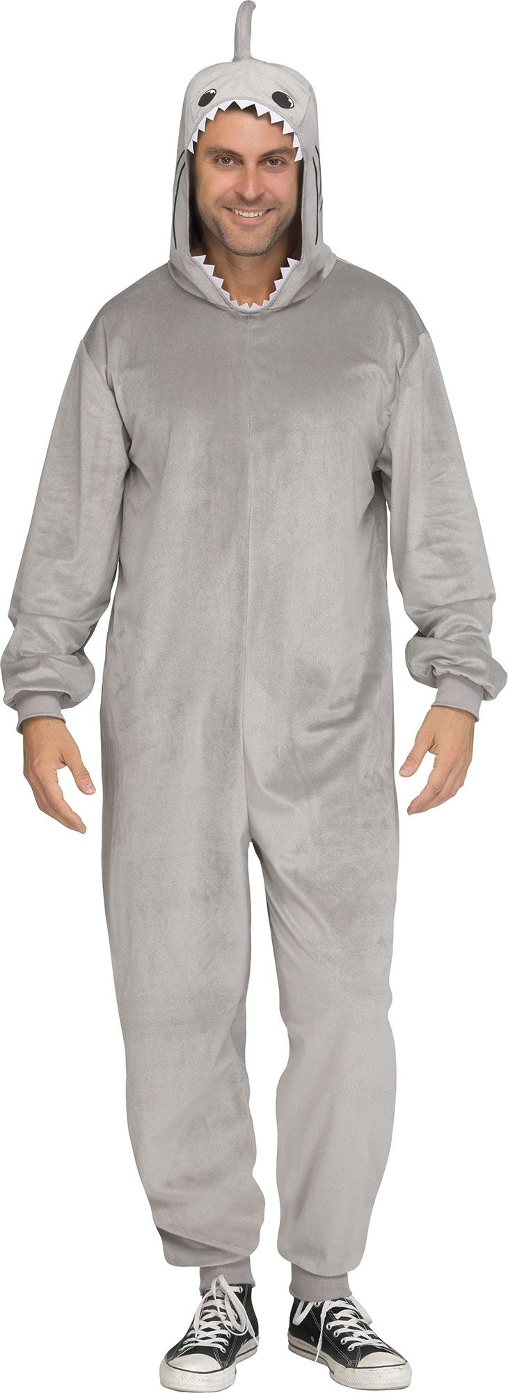 A man wearing a light gray plush shark onesie with a hood featuring a shark face and small fins, standing against a plain white background.