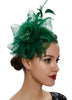 Woman wearing a green feathered headpiece on a white background