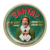 Round paper plate with festive design featuring a character and text about Santa Claus.