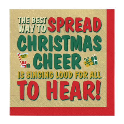Napkin with Christmas-themed text and graphics on a beige background