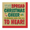 Napkin with Christmas-themed text and graphics on a beige background