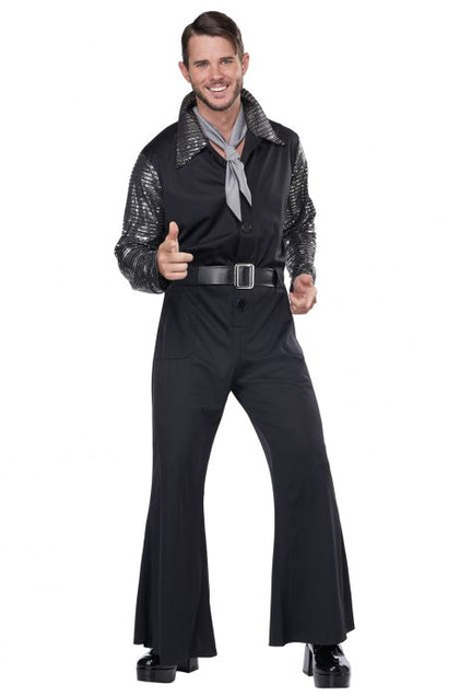 Man wearing a black outfit with a belt and gloves, giving a thumbs-up on a white background