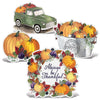 Autumn-themed decorations including a green truck, pumpkins, and a 'Always be Thankful' sign.