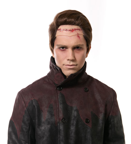 Person wearing a dark coat with bloodstains on a white background