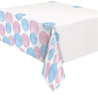 Tablecloth with pink and blue polka dot pattern on a white background