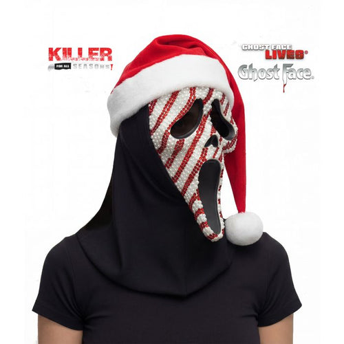 A person wearing a Ghostface from Killer Persons! Ghost Face mask with a red and white striped beaded face, a black hood, and a red and white Santa hat, shown against a white background with product logos.