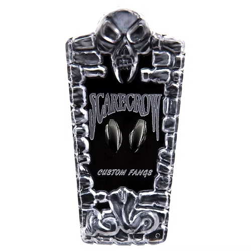 A tombstone-shaped custom fan sign featuring a skull at the top, the words 'SCARECROW' and 'CUSTOM FANGS' on a black center panel, and metallic silver scrollwork around the border.