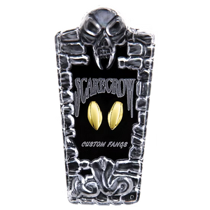 A tombstone-shaped metal display stand for custom Scarecrow themed fans, featuring a skull at the top, the word 'SCARECROW' in a stylized font, and two gold fan-shaped inserts in the center, on a plain white background.