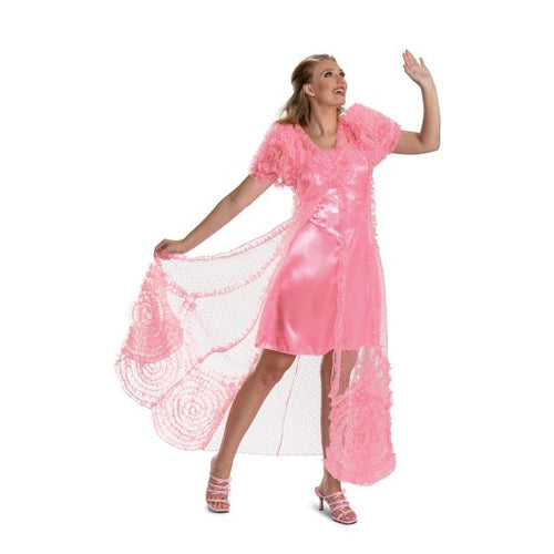 Woman wearing a pink dress with floral details on a white background
