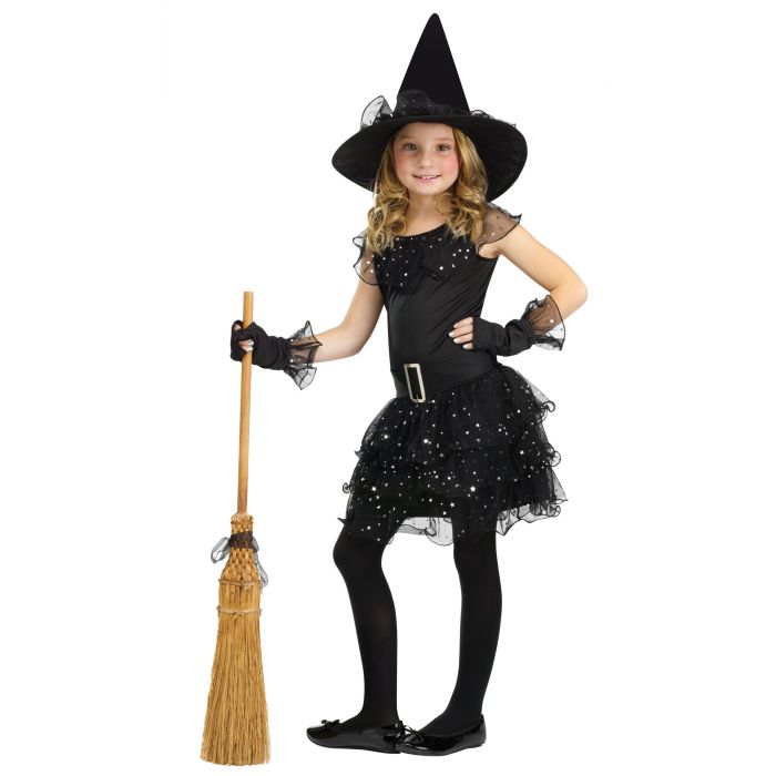 Child in a black witch costume with a broom on a white background