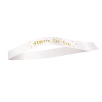 White headband with gold text on a white background