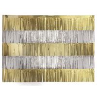 Decorative wall art with gold and silver stripes on a wooden background