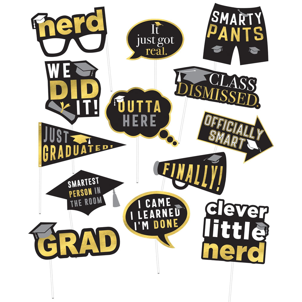 Collection of graduation-themed photo booth props with humorous sayings on a white background.
