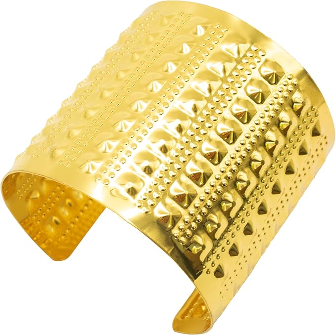 Gold cuff bracelet with textured design on a white background