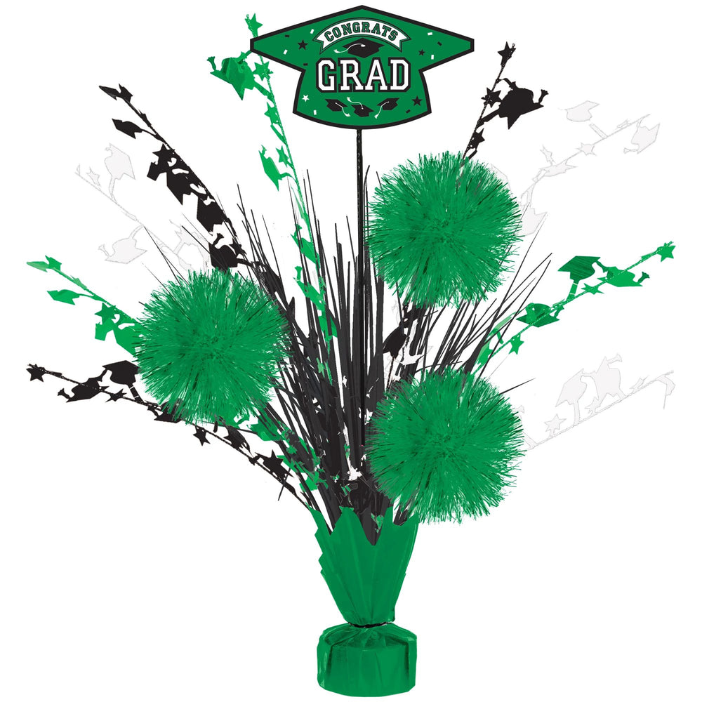 Graduation-themed centerpiece with green and black decorations on a white background