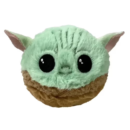 Plush toy resembling a character with a green head and brown body on a white background