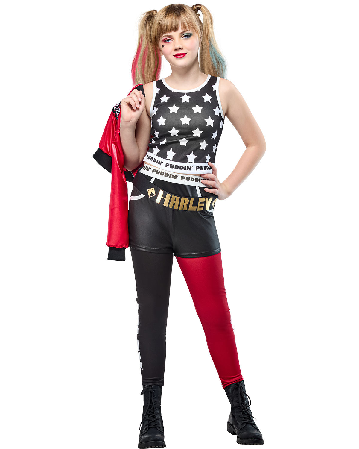 Person wearing a costume with a star-patterned top and black and red pants on a white background