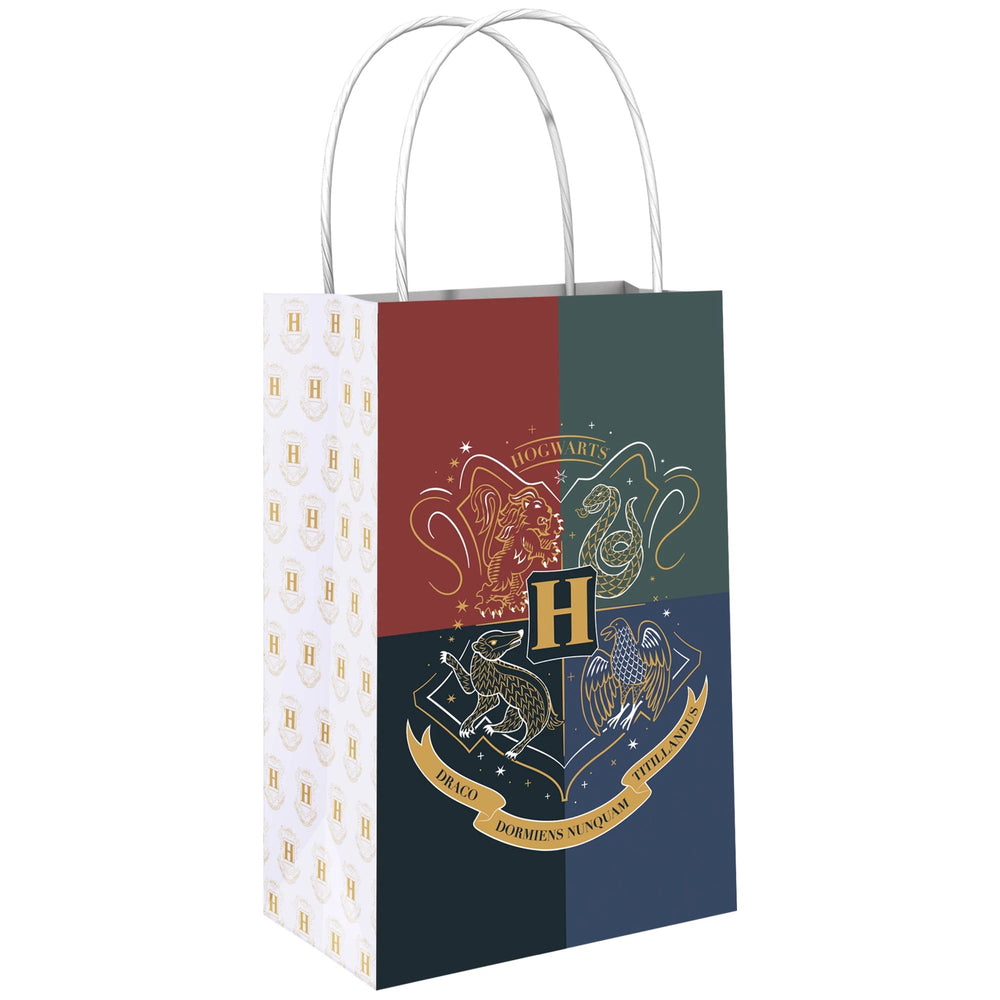 Gift bag with Hogwarts school crest design on a white background