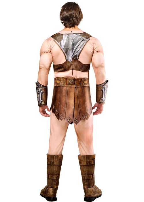 Person wearing a detailed warrior costume with armor and boots on a white background