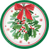 Round Christmas-themed paper plate with holly leaves, berries, and a red bow on a white background.