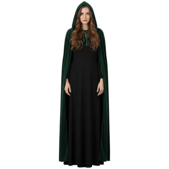 A woman modeling a long black dress with a dark green hooded cloak featuring a green collar, set against a plain white background.