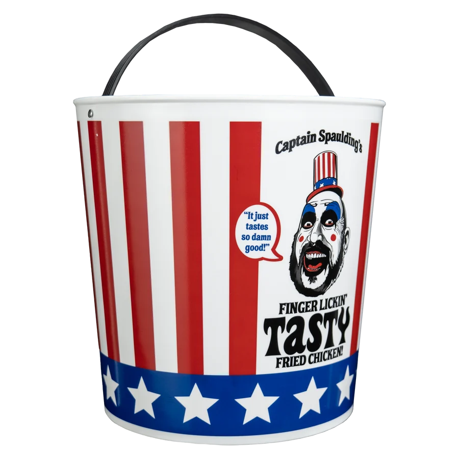 A novelty bucket with a black handle, featuring a red and white vertical stripe pattern, a blue band with white stars, and a printed graphic of Captain Spandling's Finger Lickin' Tasty Fried Chicken.