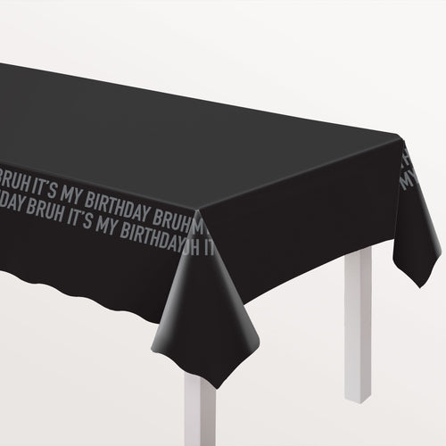 Black tablecloth with text 'BRUH IT'S MY BIRTHDAY BRUH' on a white background