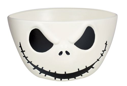 White bowl with a black face design on a white background