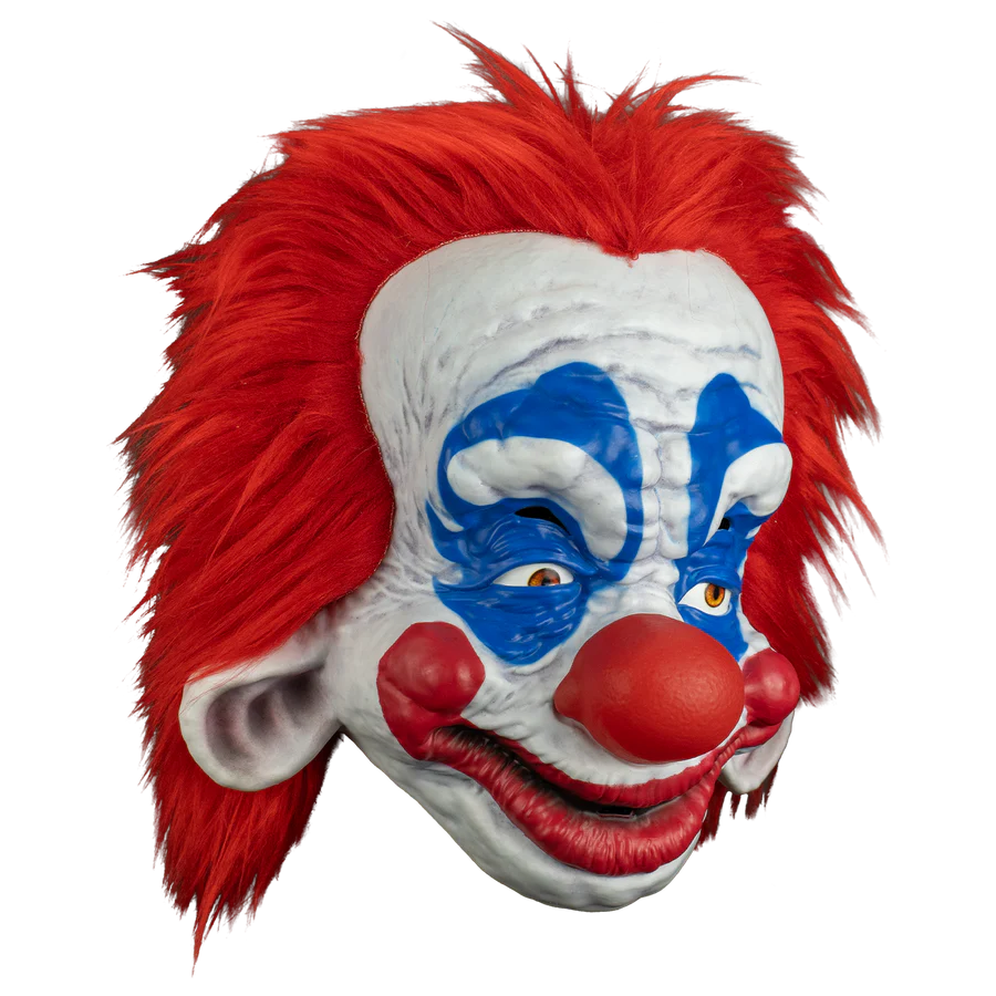 Clown mask with red hair, white face, and blue accents on a white background