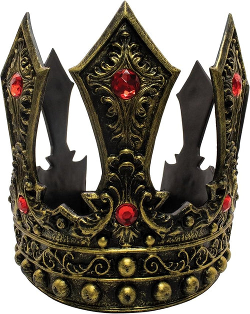 Decorative crown with intricate designs and red gemstones on a white background