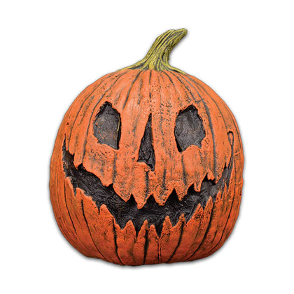 Jack-o'-lantern with a carved face on a white background