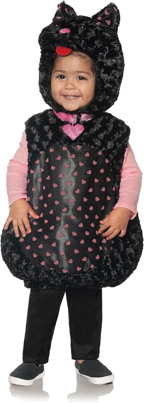 Child wearing a black cat costume with pink heart details