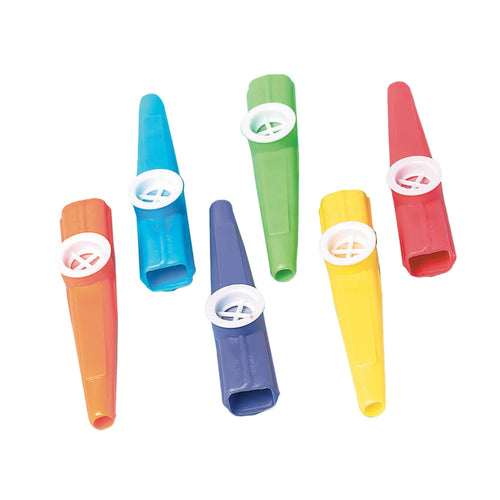 Set of colorful kazoo-like instruments on a white background