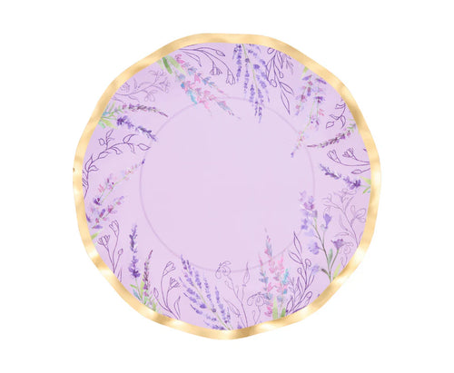Round purple plate with floral pattern on a white background