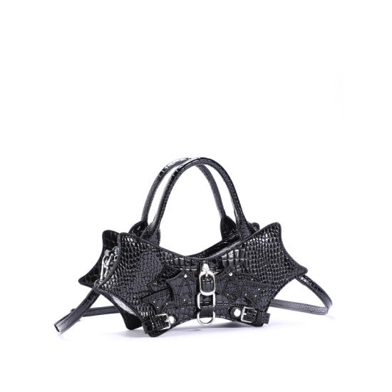 Black crocodile-embossed leather harness-style handbag with double top handles, silver-tone hardware, and a detachable shoulder strap, shown on a plain white background.
