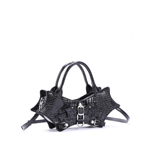 Black crocodile-embossed leather harness-style handbag with double top handles, silver-tone hardware, and a detachable shoulder strap, shown on a plain white background.