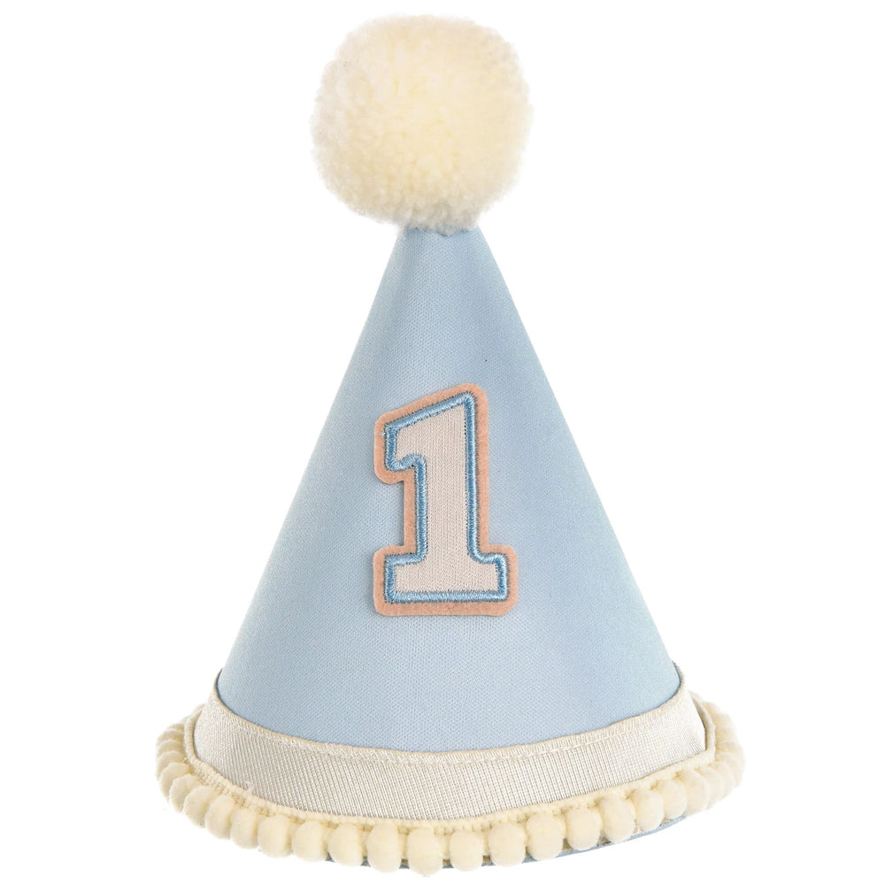 Light blue birthday hat with number '1' and white pom-pom on a white background