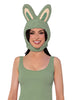 Woman wearing a green bunny hat on a white background
