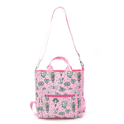 Pink tote bag with green pattern on a white background