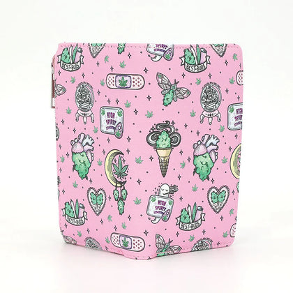 Pink pouch with green and black illustrations on a white background