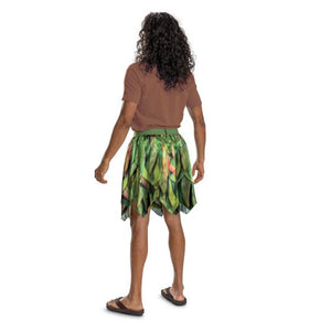 Person wearing a brown shirt and green floral skirt on a white background