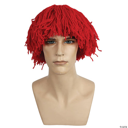 Red wig on a mannequin head against a white background