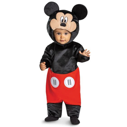 Baby in a Mickey Mouse costume on a white background