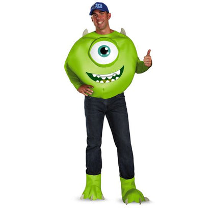 Person wearing a green inflatable costume with one eye and giving a thumbs-up on a white background