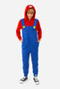 Person wearing a red and blue onesie with a hood on a white background