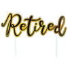 Cake topper with 'Retired' text in gold and black on a white background