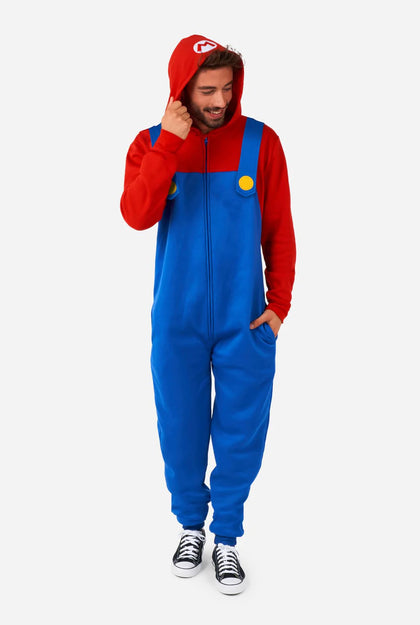 Person wearing a red and blue jumpsuit with a yellow circle on a white background