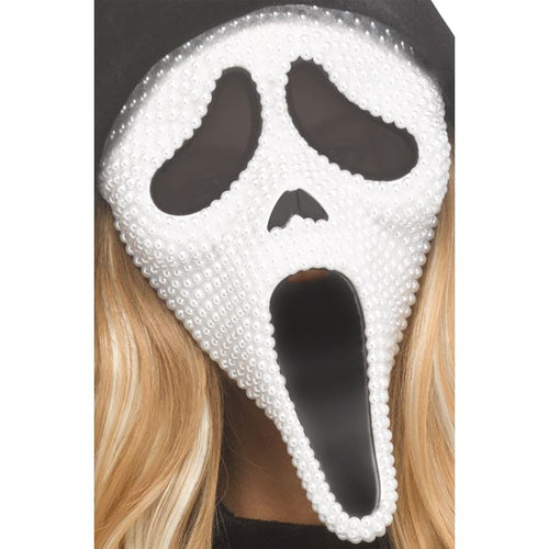 White ghost face mask with black accents worn by a person with blonde hair.