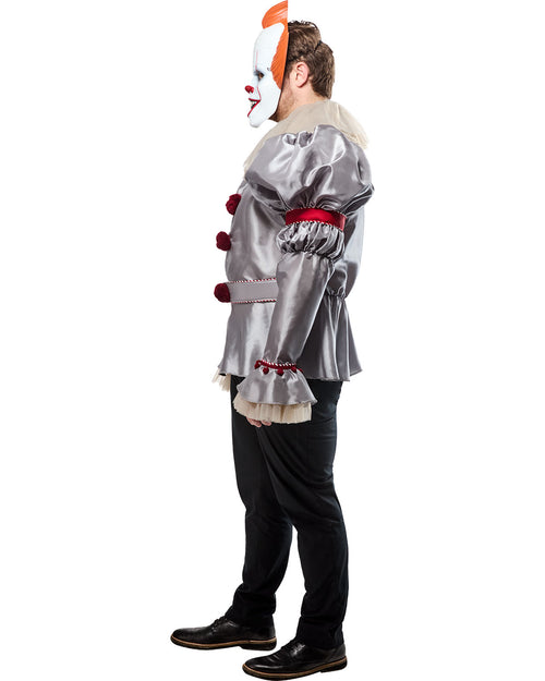 Person wearing a silver clown costume with red accents on a white background